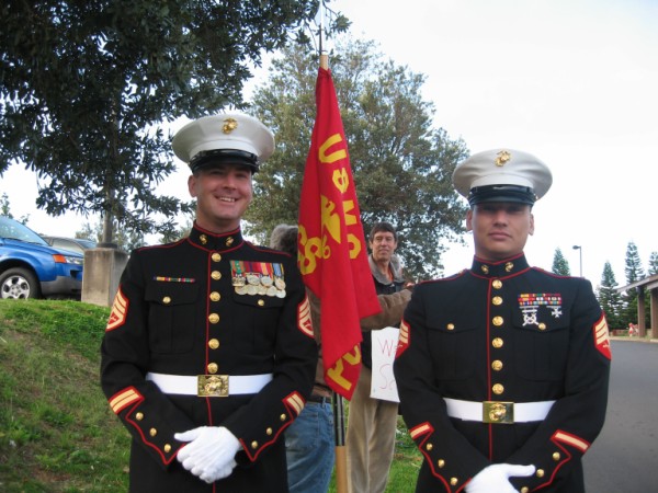 Staff Sgt. York (Left)  with Maui raised, Sgt. Benz-Marrs (Right) at KKHS' Sign Waving event, Apr. 7, 2009