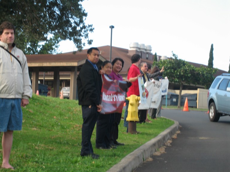Sign Wavers on the Haleakala Hwy Side