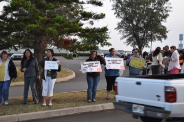 Sign Wavers represented County of Maui, Student Activities, Home Depot, Teachers at the Front Entrance